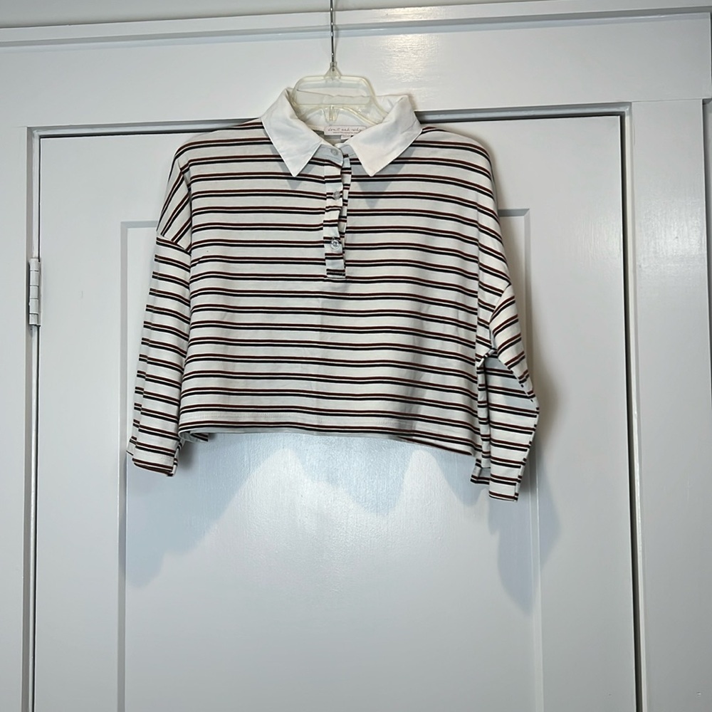 Don’t ask why brand crop top shirt. One size fits most.